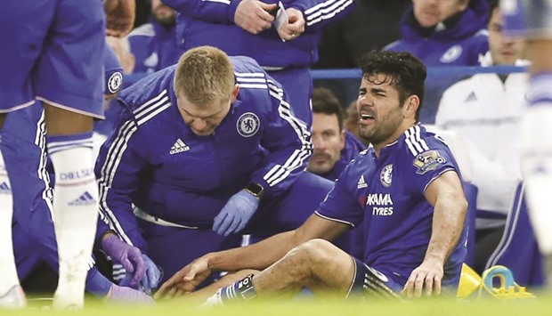 Chelsea striker Diego Costa receives treatment during Saturdayu2019s 3-3 draw with Everton. (Reuters)