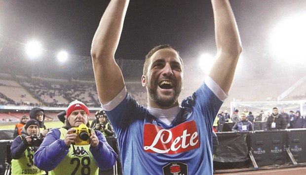 Napoli's Gonzalo Higuain celebrates at the end of the match against Sassuolo. (AFP)