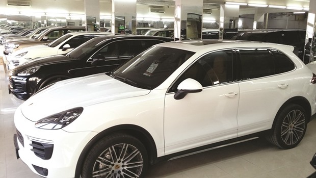 Used luxury cars and SUVs on display at a showroom along the Salwa Road. PICTURE: Joey Aguilar