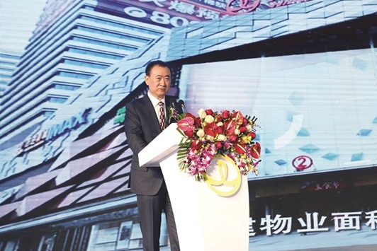 Wang Jianlin, chairman of Dalian Wanda Group, speaks during a signing ceremony with US film studio Legendary Entertainment in Beijing. Wang is increasingly looking towards entertainment to spur growth as Chinau2019s slowing economy undermines his main property business.