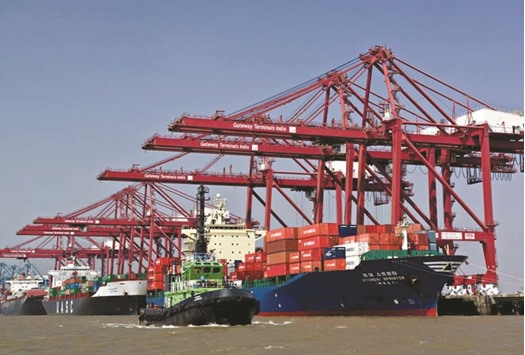 The Jawaharlal Nehru Port in Navi Mumbai. Indiau2019s merchandise exports fell for the 13th successive month in December, as orders from the US and Europe shrank and exporters grappled with a competitively weaker Chinese yuan.