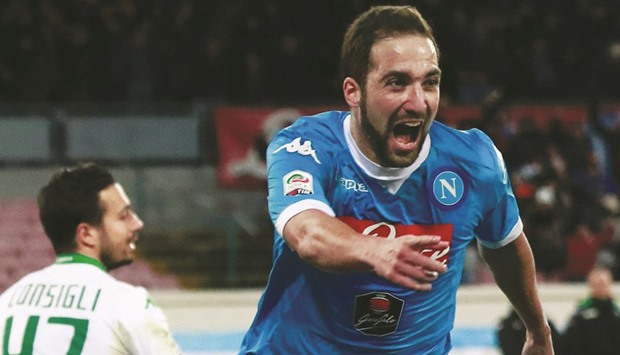Gonzalo Higuain, who joined Napoli in time for the 2013 season after six seasons at Real Madrid, has 20 goals from 20 league games. (AFP)