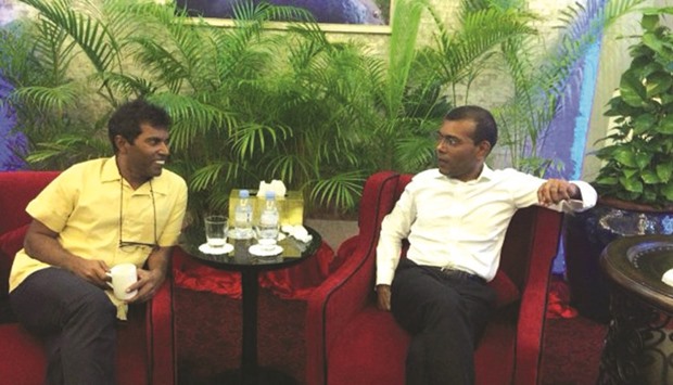 Mohamed Nasheed, left, pictured with his brother at the airport VIP lounge prior to departure to the UK yesterday.