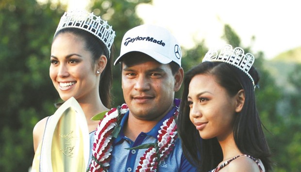PGA golfer Fabian Gomez poses with Miss Hawaii Universe and Miss Teen Hawaii after winning the Sony Open in Hawaii. PICTURE: USA TODAY Sports