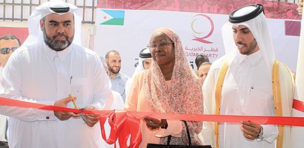 Qatar Charity Chief Executive Officer Youssuf Ahmed al-Kuwari and Djiboutiu2019s Minister for Employment and National Solidarity Zahra Yusuf Kayad inaugurating Qatar Charityu2019s new office in Djibouti yesterday.