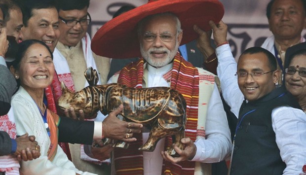 Prime Minister Narendra Modi being felicitated during a function in Guwahati yesterday.
