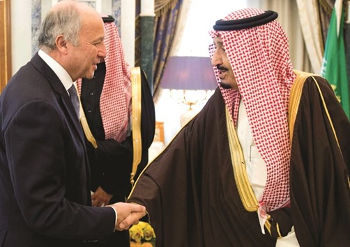 Custodian of the Two Holy Mosques King Salman of Saudi Arabia receiving French Foreign Minister Laurent Fabius during their meeting in Riyadh yesterday.