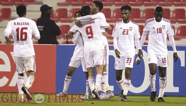 UAE players celebrate a goal yesterday. PICTURES: Noushad Thekkayil