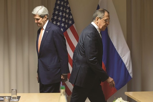 US Secretary of State John Kerry (left) and Russian Foreign Minister Sergey Lavrov arrive for talks on the Syria peace process in Zurich yesterday.