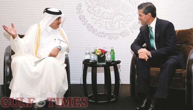 Sheikh Khalifa and Nieto get into a huddle during the Qatar-Mexico Business Forum. PICTURE: Jayaram