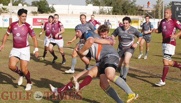 Action from the West Asia Championship match between Doha 1st XV (in maroon and white) and Dubai Hurricanes at Doha Rugby Football Club yesterday. PICTURES: Jayaram