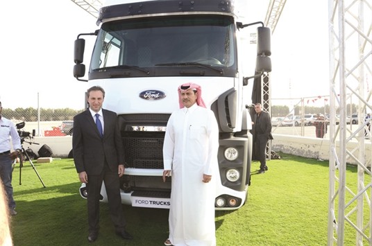 Bader al-Mana with Ford Trucks International Markets director Emrah Duman. Preferred by concrete plants and long haulage transportation across the region, Ford trucks offer high quality and durability with low initial investment and operating costs.