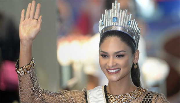 Miss Universe Pia Alonzo Wurtzbach of the Philippines waves during her homecoming