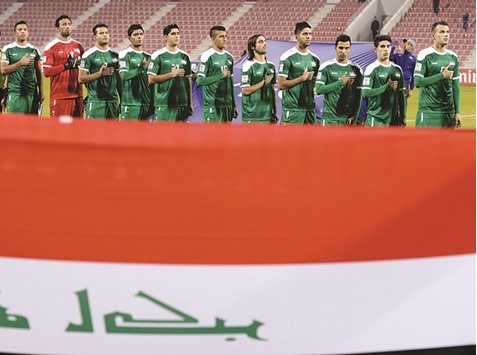 File picture of Iraq team standing in attention for their national anthem before the start of an AFC U23 Championship game.