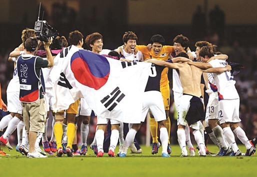 File picture of Korea players celebrating after defeating Japan during the 2012 London Olympics Menu2019s Football Bronze medal play-off match.