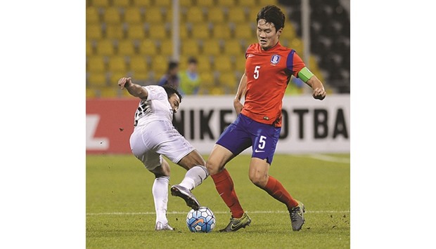 File picture of South Korea captain Yeon Jei-min (R) in action.