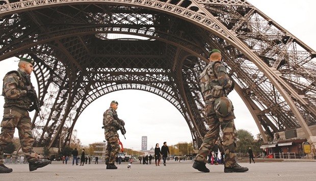 Members of the French Foreign Legion guarding near the Eiffel Tower  in Paris on  November 16 after the terror attacks three days before.