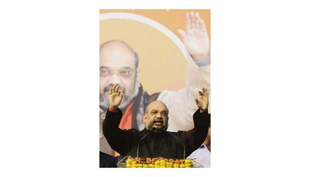 BJP chief Amit Shah addresses a public meeting in Howrah, some 10km west of Kolkata yesterday.