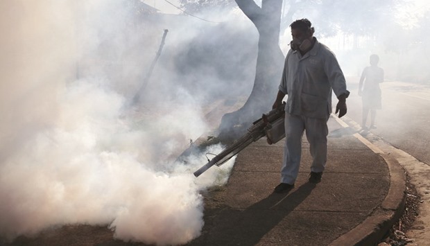 A health ministry worker fumigates a street to kill mosquitoes during a campaign to prevent the entry of Zika virus in Managua, Nicaragua, yesterday.