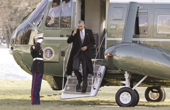 President Obama steps off Marine One upon arrival at the White House in Washington.