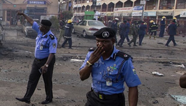 Police at the scene of  the suicide attack