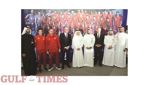 Akbar Al Baker, Group Chief Executive of Hamad International Airport (centre) with Bayern Munich star player Franck Ribery (third left) and other officials during the signing ceremony yesterday. PICTURE: Thajudheen