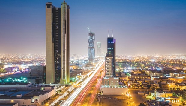 Light trails from traffic illuminate highways surrounded by residential buildings in Riyadh. Saudi Arabia is pursuing foreign investment with a new sense of urgency as the prolonged oil price slump forces the worldu2019s largest oil exporter to find alternative sources of revenue.
