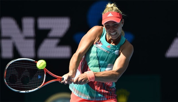 Germany's Angelique Kerber plays a backhand return during her women's singles semi-final match against Britain's Johanna Konta on day eleven of the 2016 Australian Open tennis tournament in Melbourne. AFP