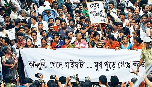Protest in of Kolkata against the gang-rape and murder of the college student in Kamduni village. 2013 June file picture.