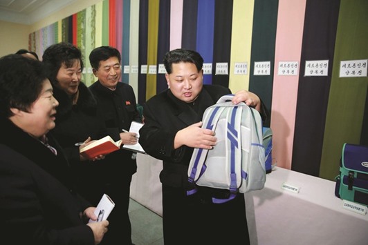 North Korean leader Kim Jong Un provides field guidance to the Kim Jong Suk Pyongyang Textile Mill, in this undated file photo released by North Koreau2019s Korean Central News Agency