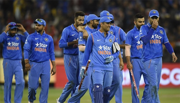 MS Dhoni of India (C) leads his team off the pitch after beating Australia in the second Twenty20 in