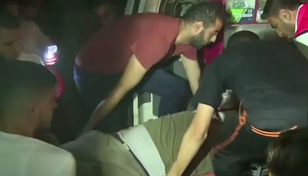 Injured people are being taken to hospital in Gaza after the attacks by Israeli air force