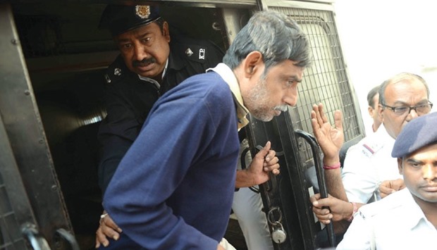One of men convicted in the Kamduni gang-rape and murder case being brought to a court in Kolkata yesterday.