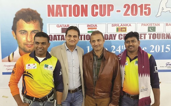 STAR APPEAL: Event Sponsor Siraj Virani, Managing Director of Qad-Net Qatar, second left, with Nayan Mongia, second right, and players at the prize distribution ceremony.