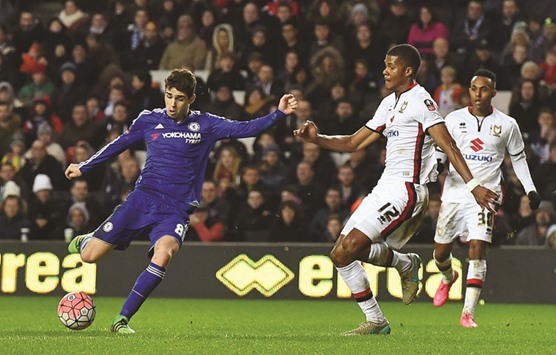Chelseau2019s midfielder Oscar shoots to score his third goal during the English FA Cup fourth round match against MK Dons in Milton Keynes, central England, yesterday. (AFP)