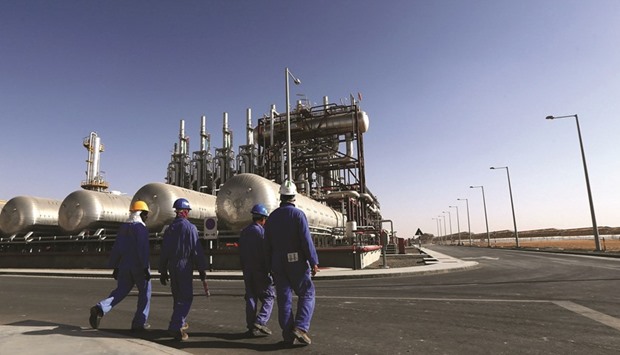 Workers walk inside the Shams 1, Concentrated Solar Power (CSP) plant, in Al-Gharibiyah district on the outskirts of Abu Dhabi (file). At present the Mena region accounts for less than 1% of the wordu2019s consumption of solar and wind power, according to the BP Statistical Review of World Energy. But its contribution to clean energy production and its consumption of energy from these sources is set to increase rapidly in the next few years with the completion of a string of new projects in Morocco, Egypt, Jordan and the UAE.