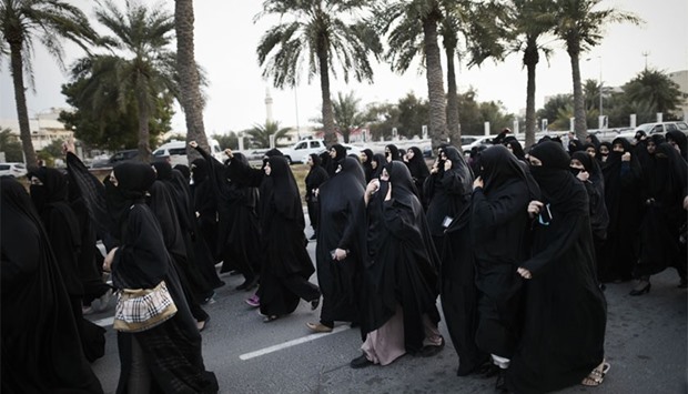 Bahraini women take part in a protest in the village of Jidhafs, west of Manama, against the execution of prominent Shia Muslim cleric Nimr al-Nimr. AFP