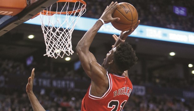 Jimmy Butler (No 21) of the Chicago Bulls drives to the basket  during an NBA game at the Air Canada Centre in Toronto. (Getty Images/AFP
