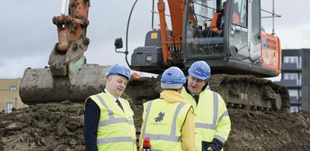 Bellway chief executive Ted Ayres (left) and Prime Minister David Cameron visit a Bellway housing development in Barking, east London, yesterday.
