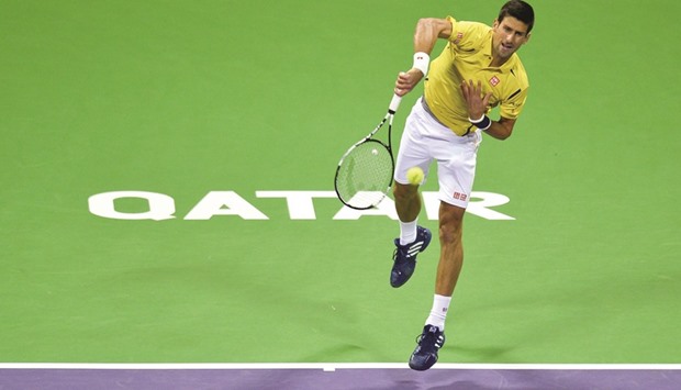 Novak Djokovic serves during his Qatar ExxonMobil Open first round match against Dustin Brown at Khalifa Tennis Complex yesterday. PICTURE: Noushad Thekkayil