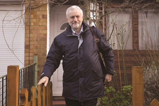 Opposition Labour Party leader Jeremy Corbyn leaves his home in north London yesterday.