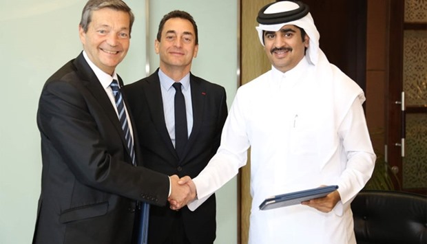 HE the Minister of Public Health Abdullah bin Khalid al-Qahtani shake hands with Institut Pasteur director general Prof Christian Brechot after signing the MoU as French ambassador Eric Chevallier looks on.