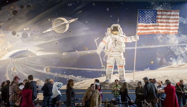 Moviegoers lining up for a showing of ,Star Wars: The Force Awakens, at the IMAX movie theater in the Smithsonian National Air and Space Museum in Washington, DC late last month.