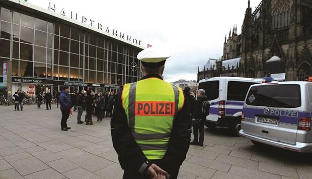 The police are seen yesterday in the area in front of the main train station and the cathedral in Cologne, where dozens of apparently co-ordinated sexual assaults were perpetrated against women on New Yearu2019s Eve.
