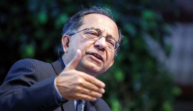 Kaushik Basu, senior vice-president and chief economist at the World Bank Group, gestures as he speaks during a lecture at the Austrian central bank in Vienna on November 16, 2015. u201cThe global economy will need to adapt to a new period of more modest growth in large emerging markets, characterised by lower commodity prices and diminished flows of trade and capital,u201d Basu said in the report yesterday.