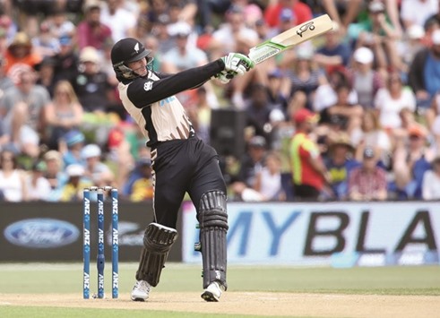 Martin Guptill of New Zealand plays a shot during the first Twenty20 match against Sri Lanka at the Bay Oval in Mount Maunganui yesterday. (AFP)