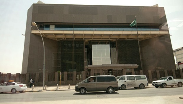 The headquarters of Saudi Arabiau2019s central bank stand in Riyadh (file). Many bankers in the Gulf believe Riyadh remains very unlikely to break its currency peg. They note that foreign assets still totalled $628bn at the end of December - enough to keep defending the riyal for years.