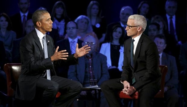 President Barack Obama participates in a live town hall event on reducing gun violence hosted by CNN's Anderson Cooper at George Mason University in Fairfax, Virginia.