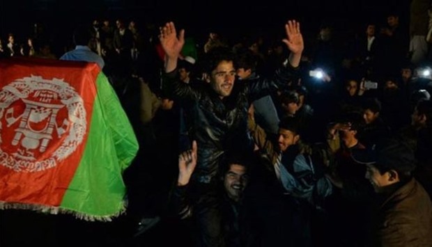 Jubilant fans danced in the streets and fired into the air as Afghanistan defeated Zimbabwe to take the series 3-2.
