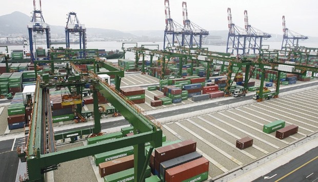 Containers stacked up at the Port of Taipei. Taiwanu2019s December exports were down 13.9% from a year earlier, an 11th straight decline, the finance ministry said yesterday.